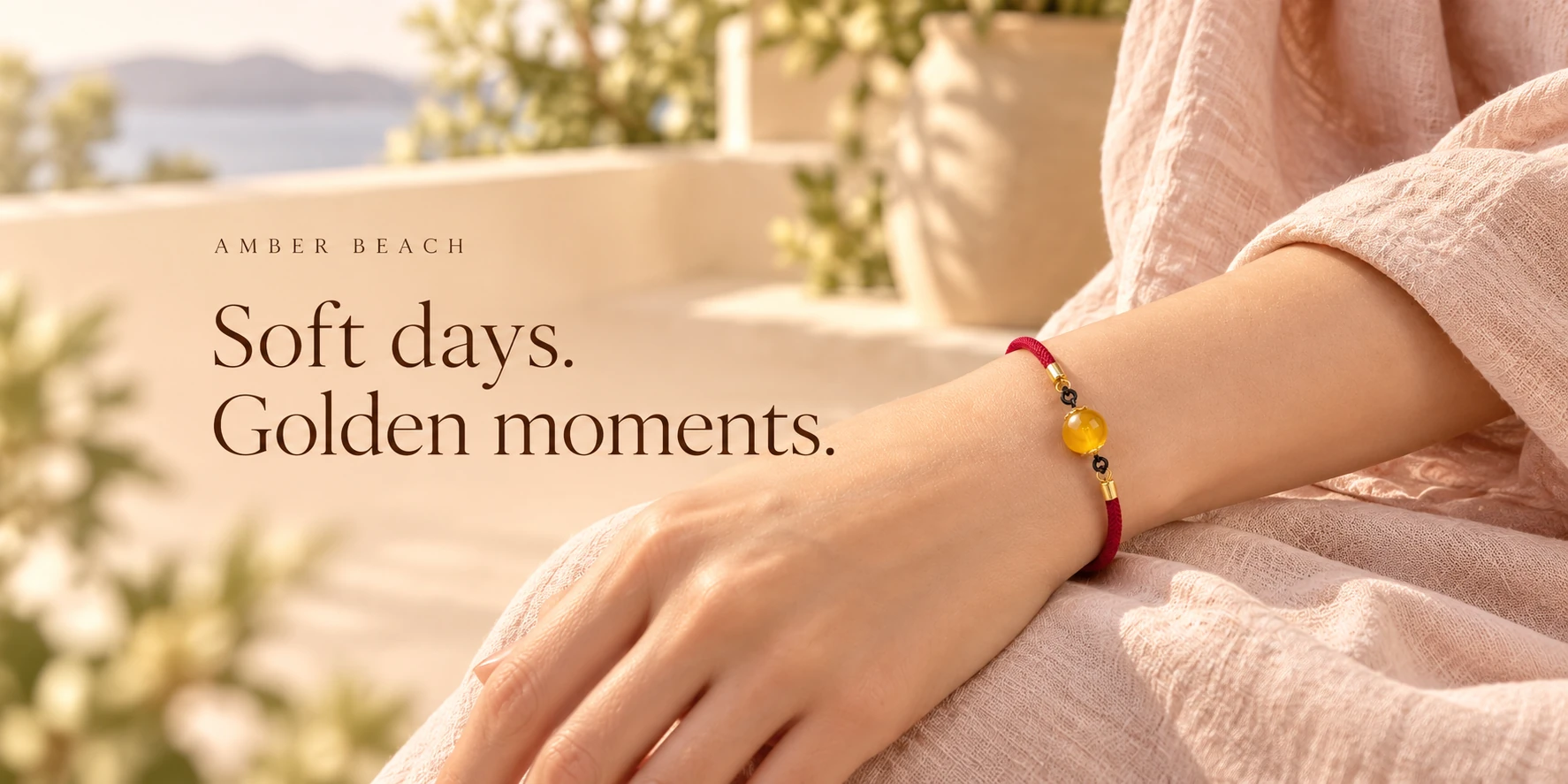 Soft days. Golden moments. Red honey amber bracelet on a warm terrace.