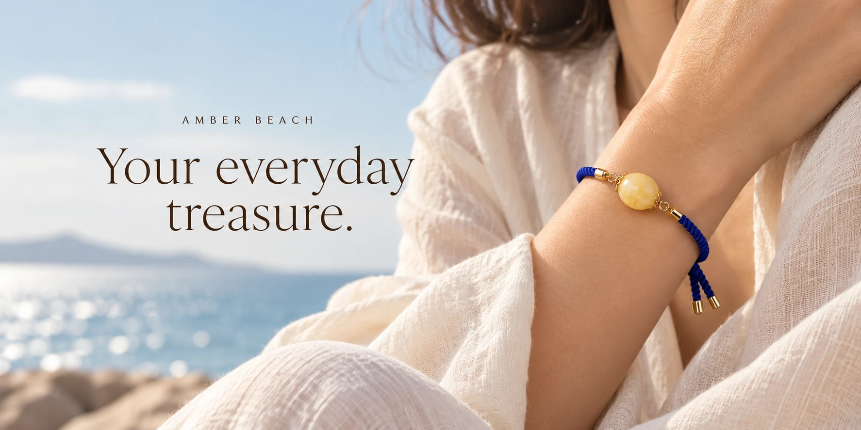 Your everyday treasure. Pale yellow amber bracelet in soft coastal light.